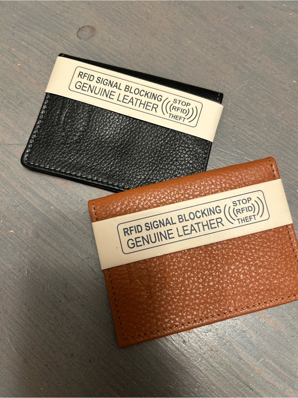 2 Bass leather wallets